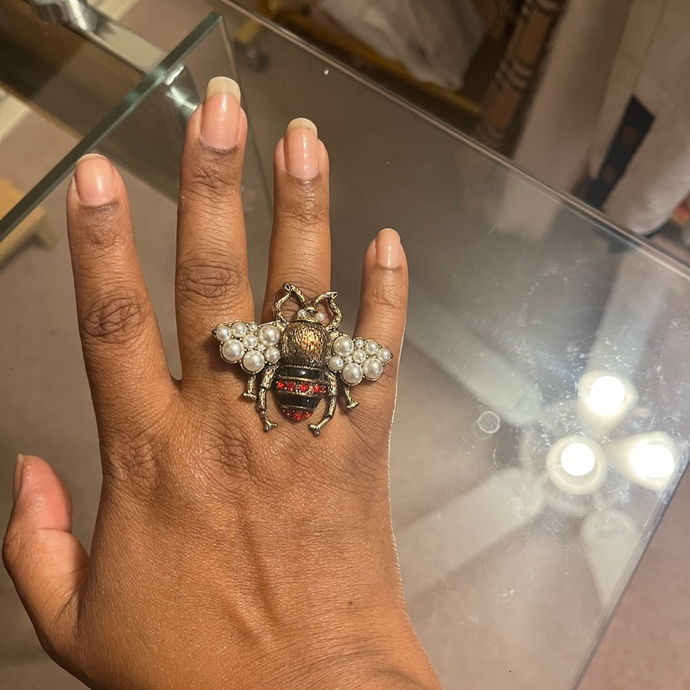Fashionable multi gem large cocktail bee ring. Adjustable size up to 9